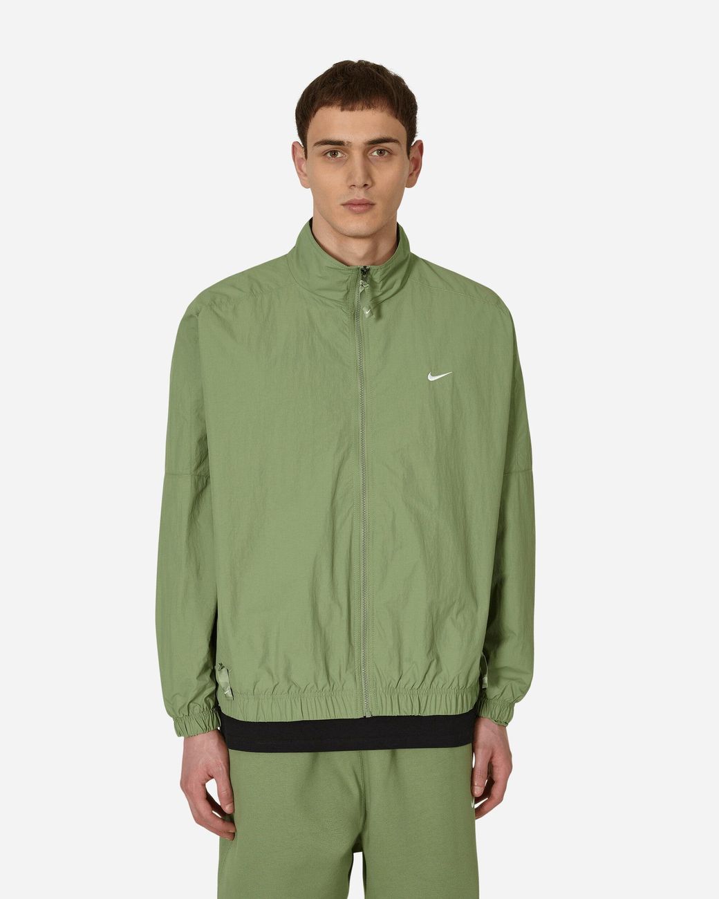 Nike green on sale track jacket