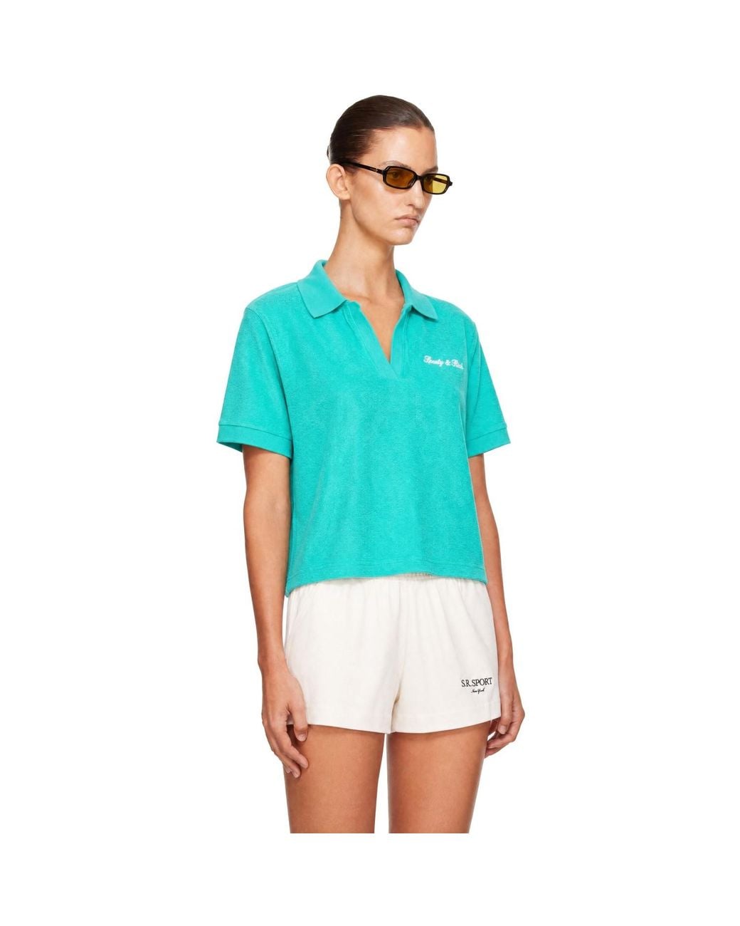 Sporty & Rich Blue Signature Logo Terry Polo