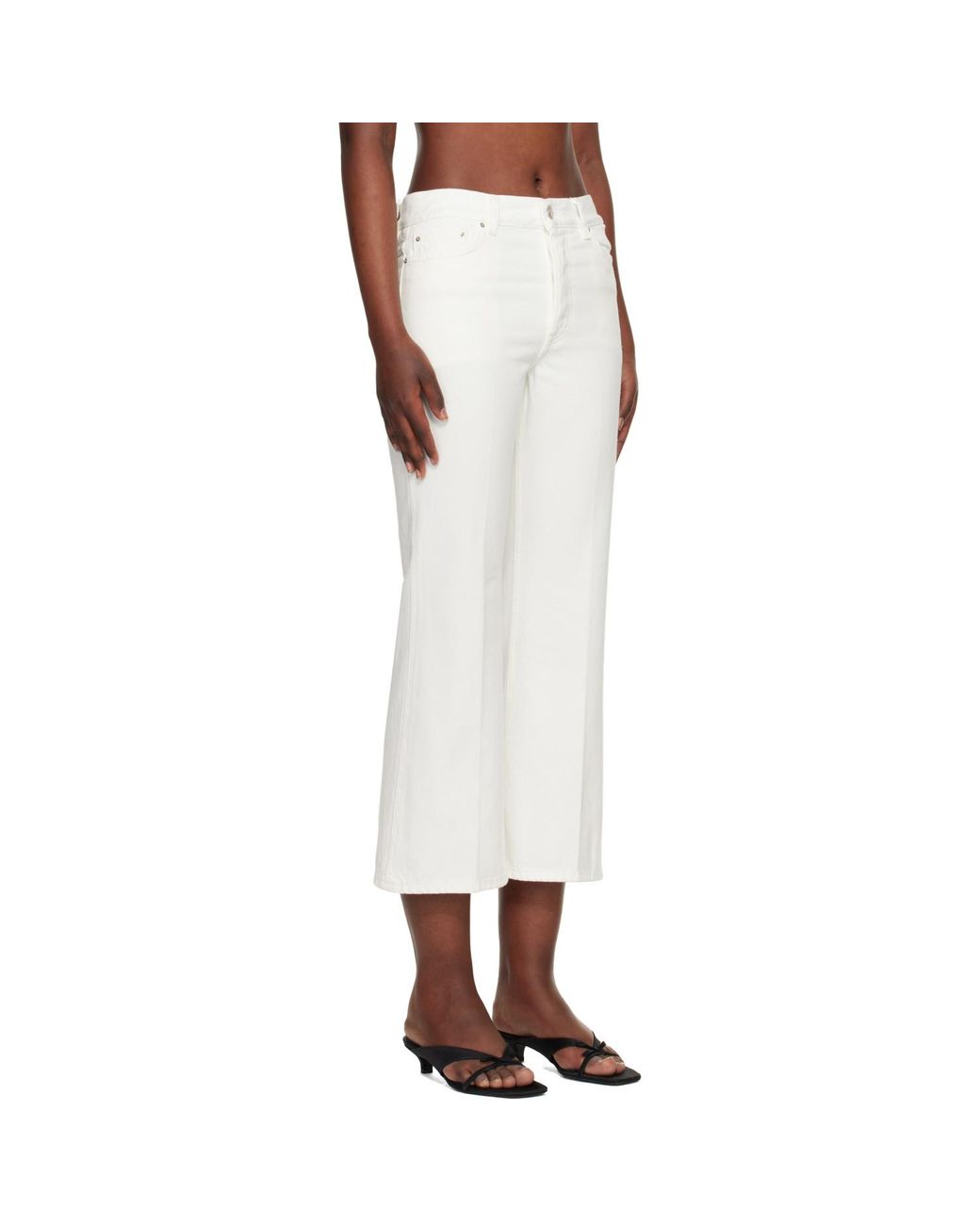 Totême White Kick Flare Jeans