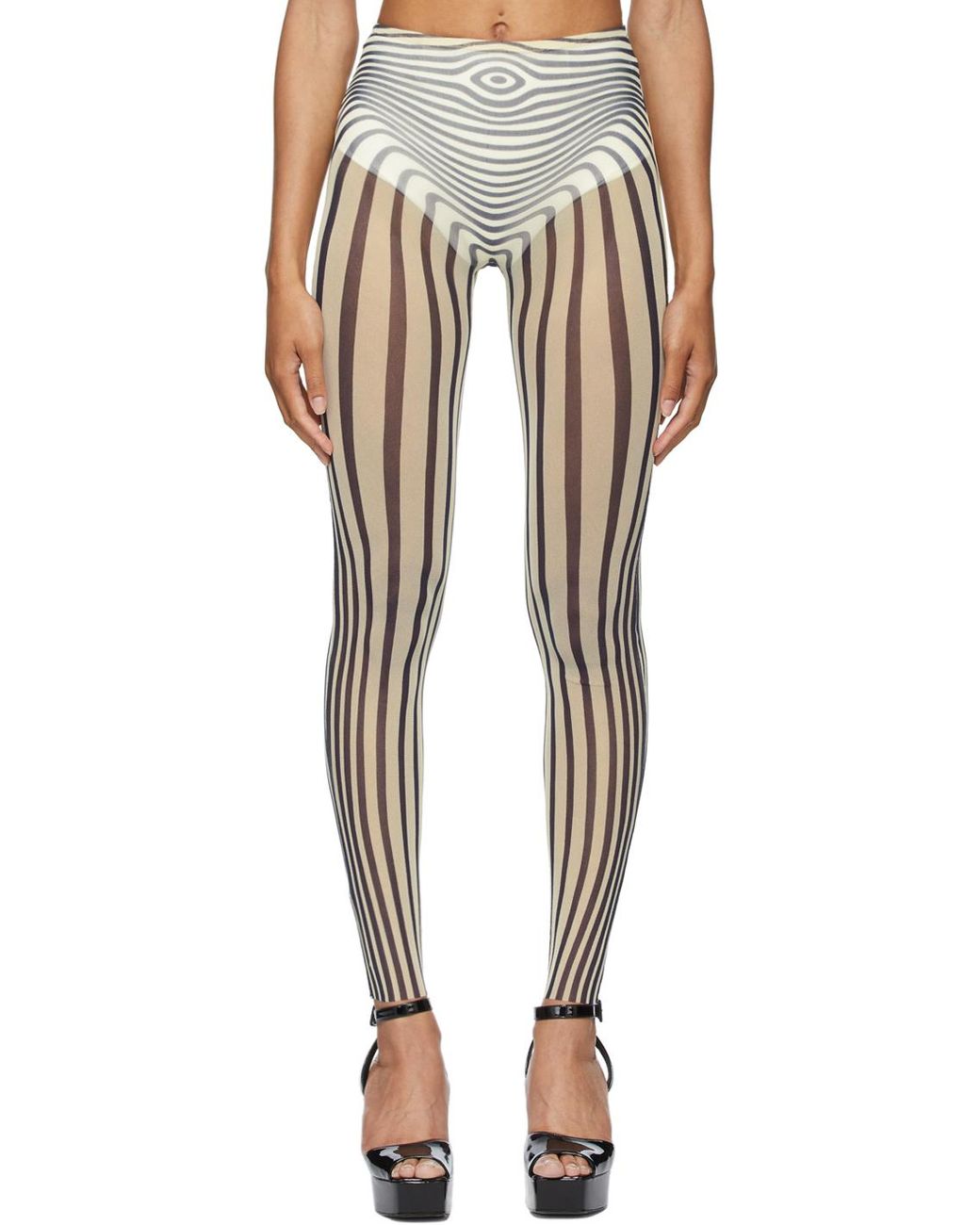 https://cdna.lystit.com/1040/1300/n/photos/ssense/8a249b92/jean-paul-gaultier-EcruMidnightB-Ssense-Exclusive-Off-Les-Marins-Body-Stripe-leggings.jpeg