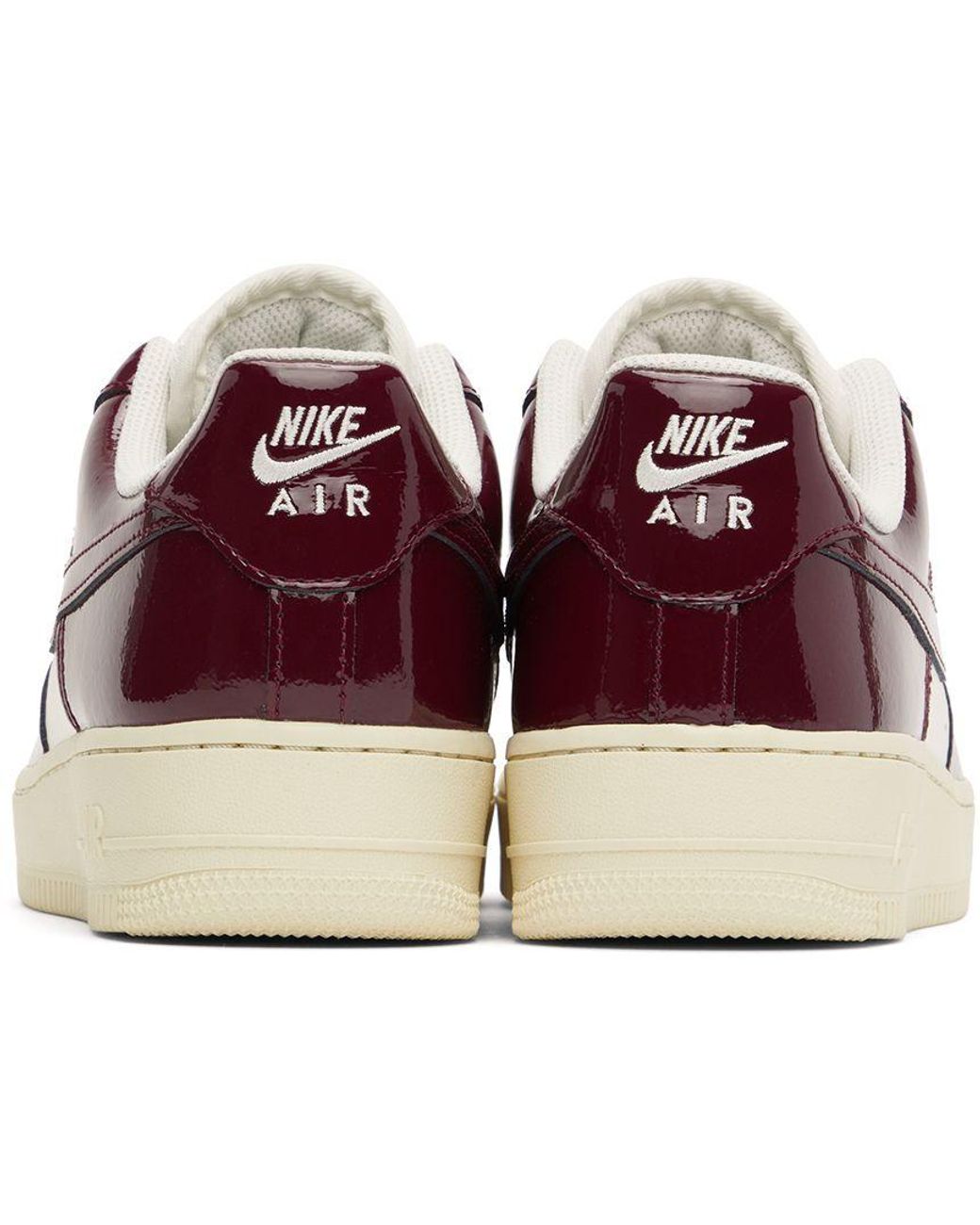white and burgundy nikes