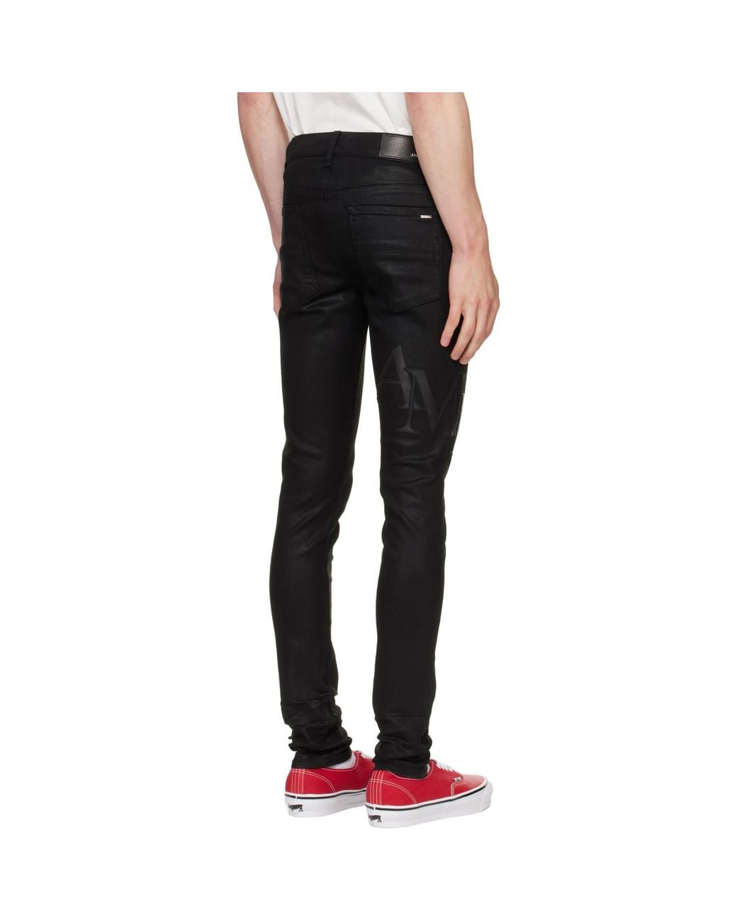 Amiri Black Waxed Staggered Logo Skinny Jeans for men