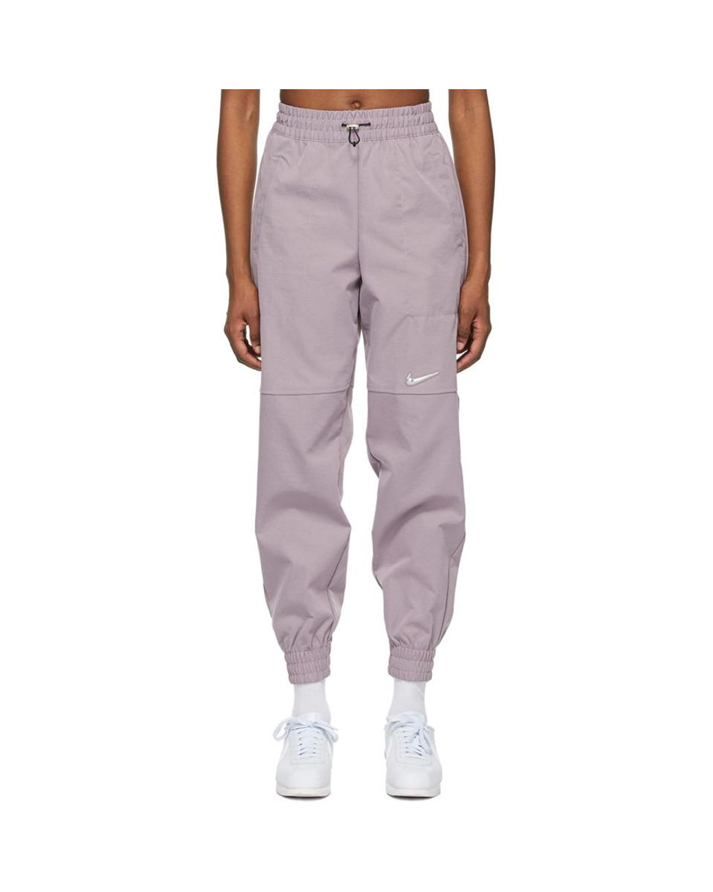 Nike Purple Woven Sportswear Swoosh Lounge Pants - Lyst