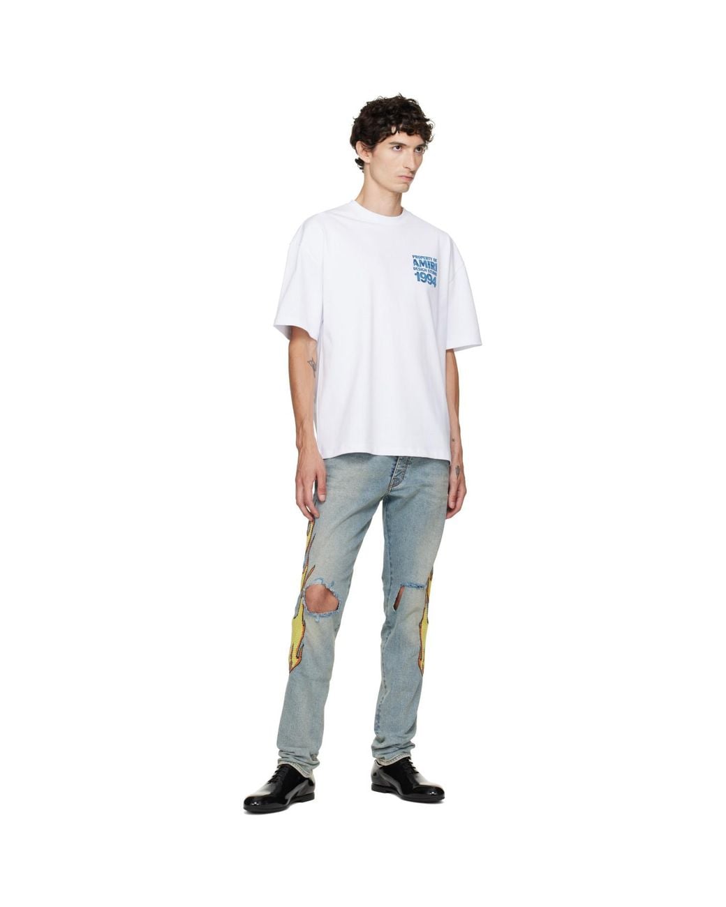 Amiri Blue Flames Emb Skinny Jeans for men