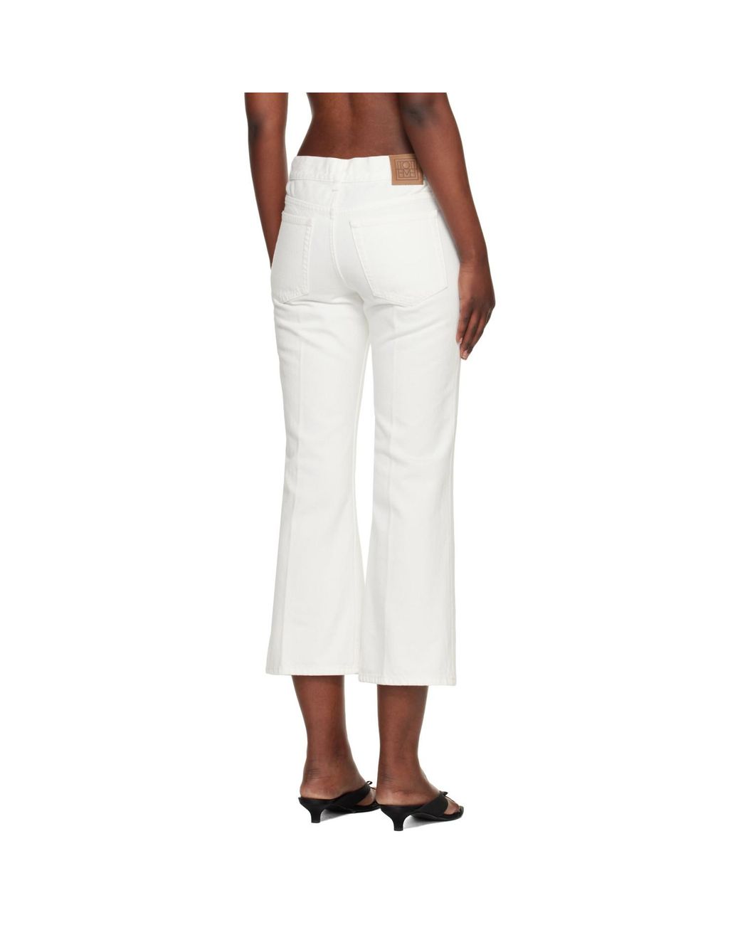 Totême White Kick Flare Jeans