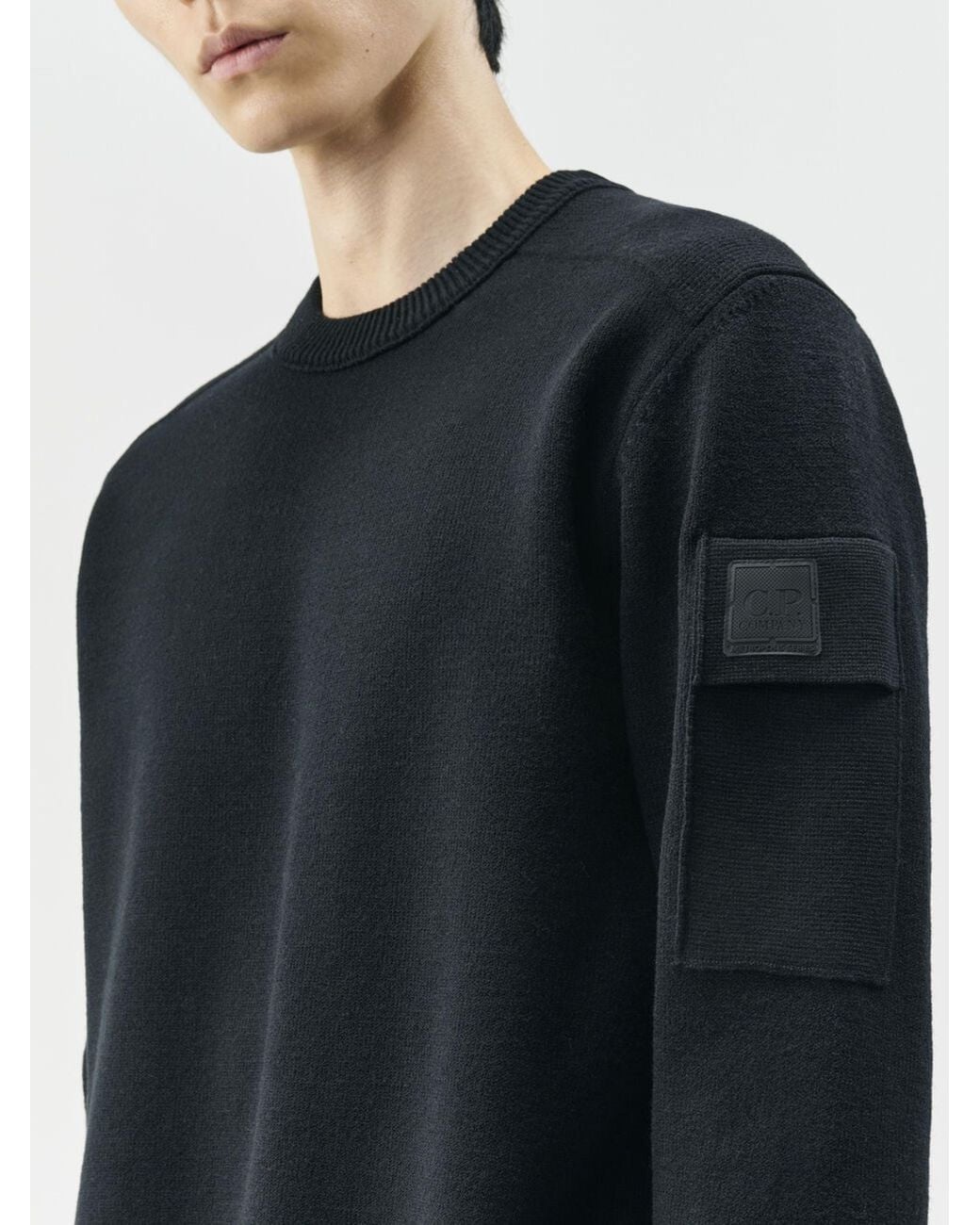 C P Company Black Extrafine Merino Wool Crewneck Sweater With Distinctive Sleeve Pocket for men