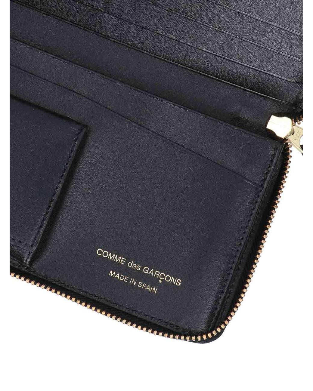 Comme des Garçons White Polka Dot Zip Wallet