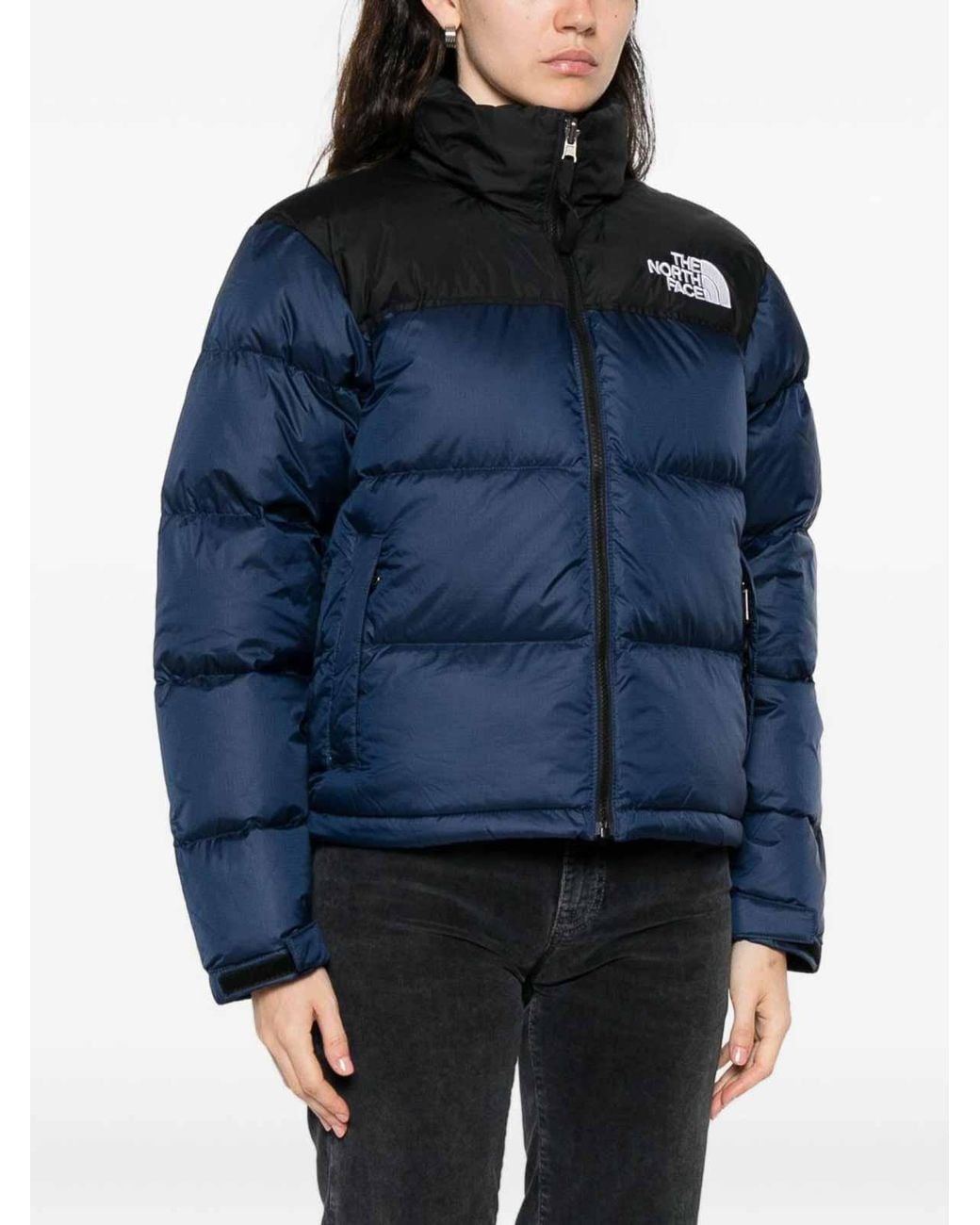 The North Face Blue Quilted Puffer Jacket With High Collar