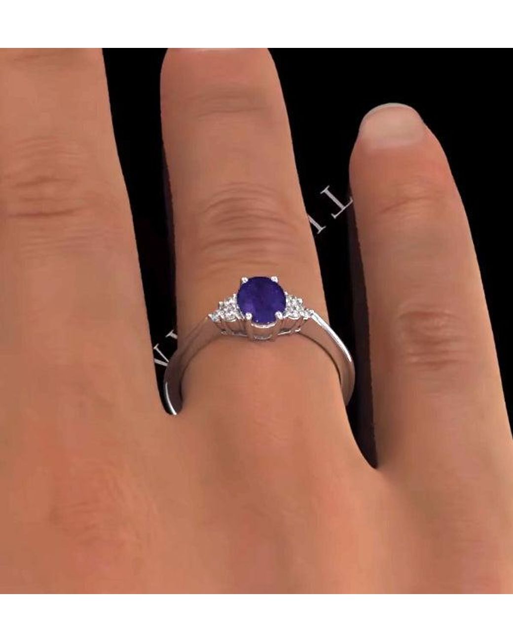 The Diamond Store Blue Tanzanite 7 X 5Mm And Diamond 18K Ring N3493Y