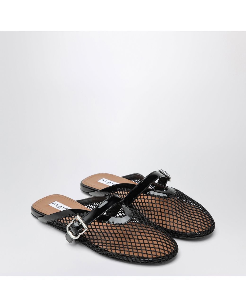 Alaïa Black Flat Mesh Mules With Buckle Strap