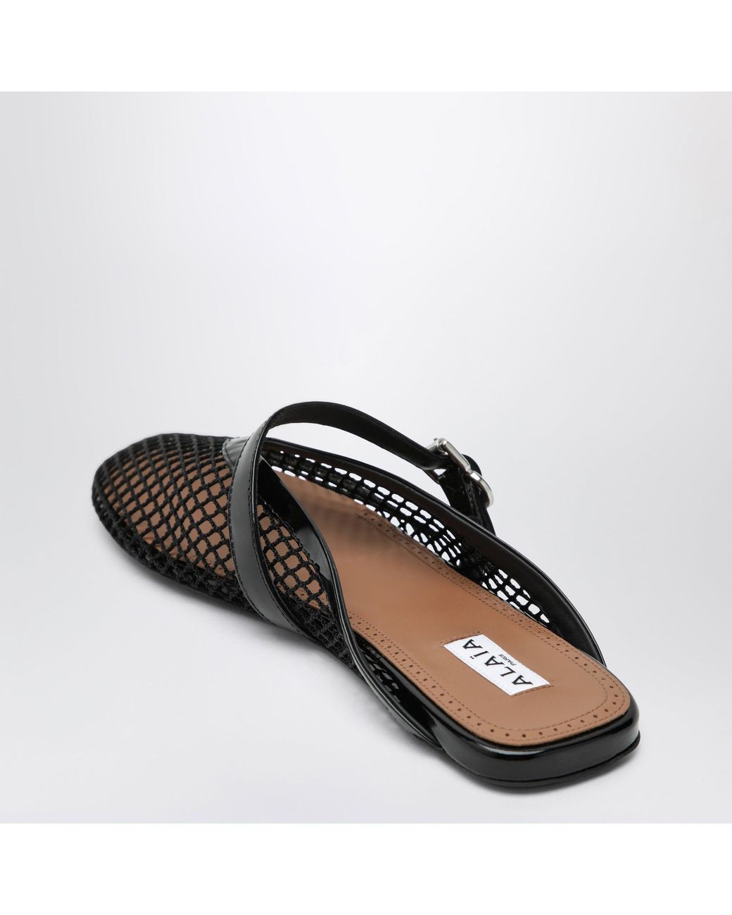 Alaïa Black Flat Mesh Mules With Buckle Strap