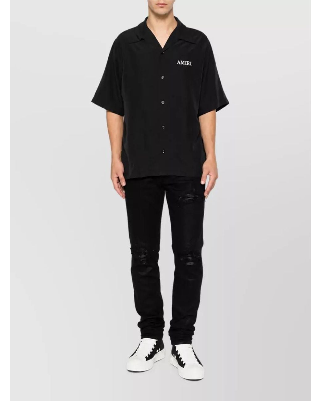 Amiri Black Waxed Distressed Skinny Denim Jeans for men