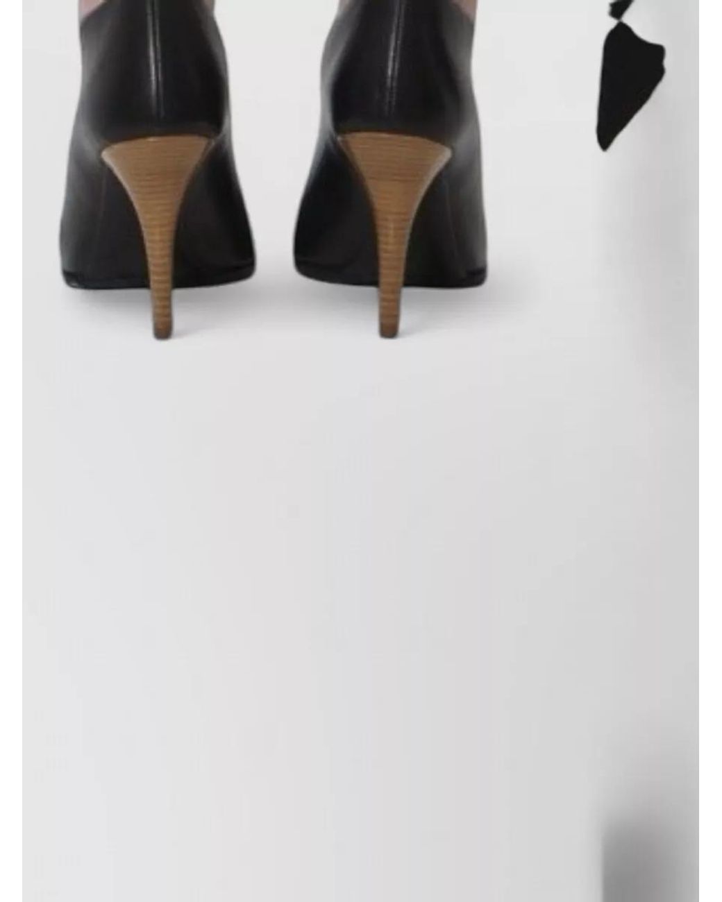 Alaïa Black Virgin Wool Asymmetric Mid-Rise Mini Skirt