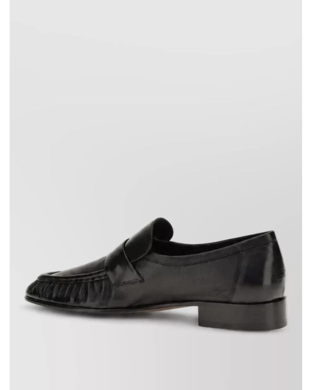 The Row Black Leather Slip-On Loafers