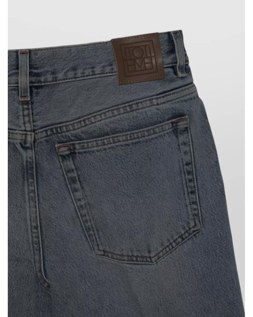 Totême Blue Denim Flared Trousers