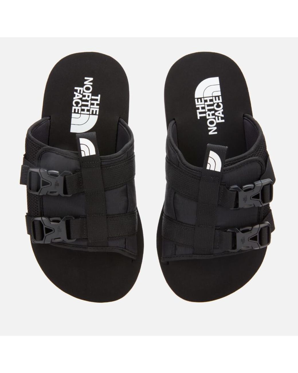 pink north face sliders