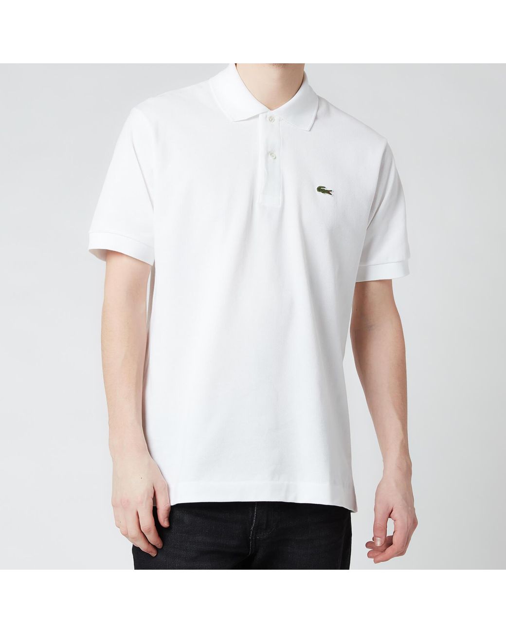 Lacoste Polo Shirt in White classic two button in cotton pique short sleeved 