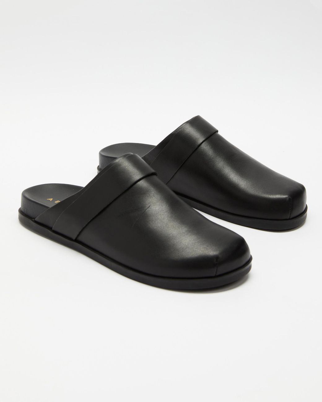 AERE Closed Toe Footbed Slides in Black | Lyst Australia