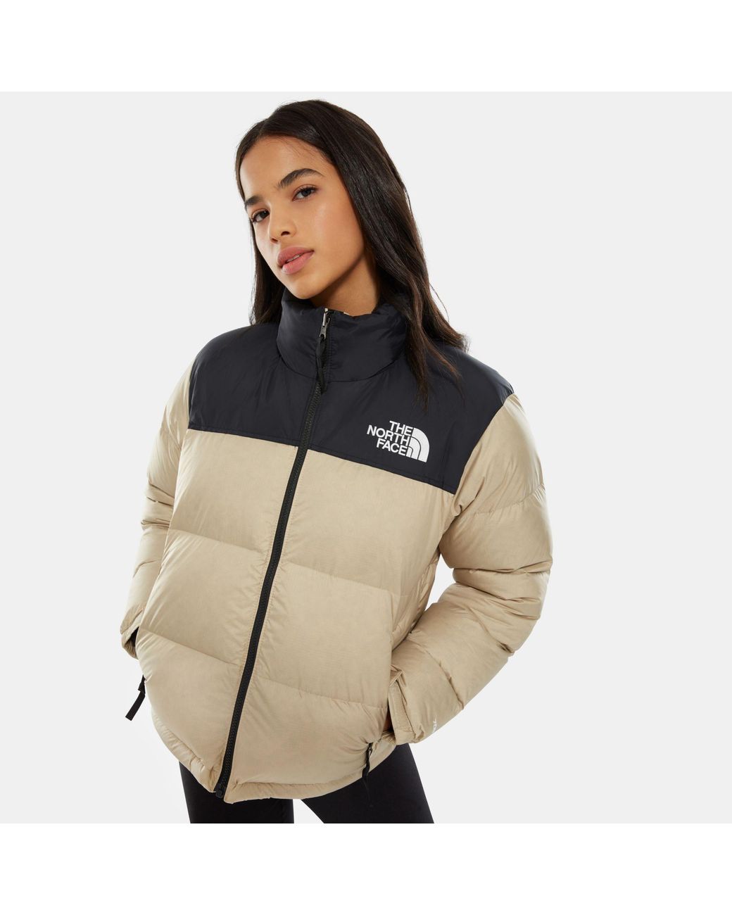 beige north face tracksuit