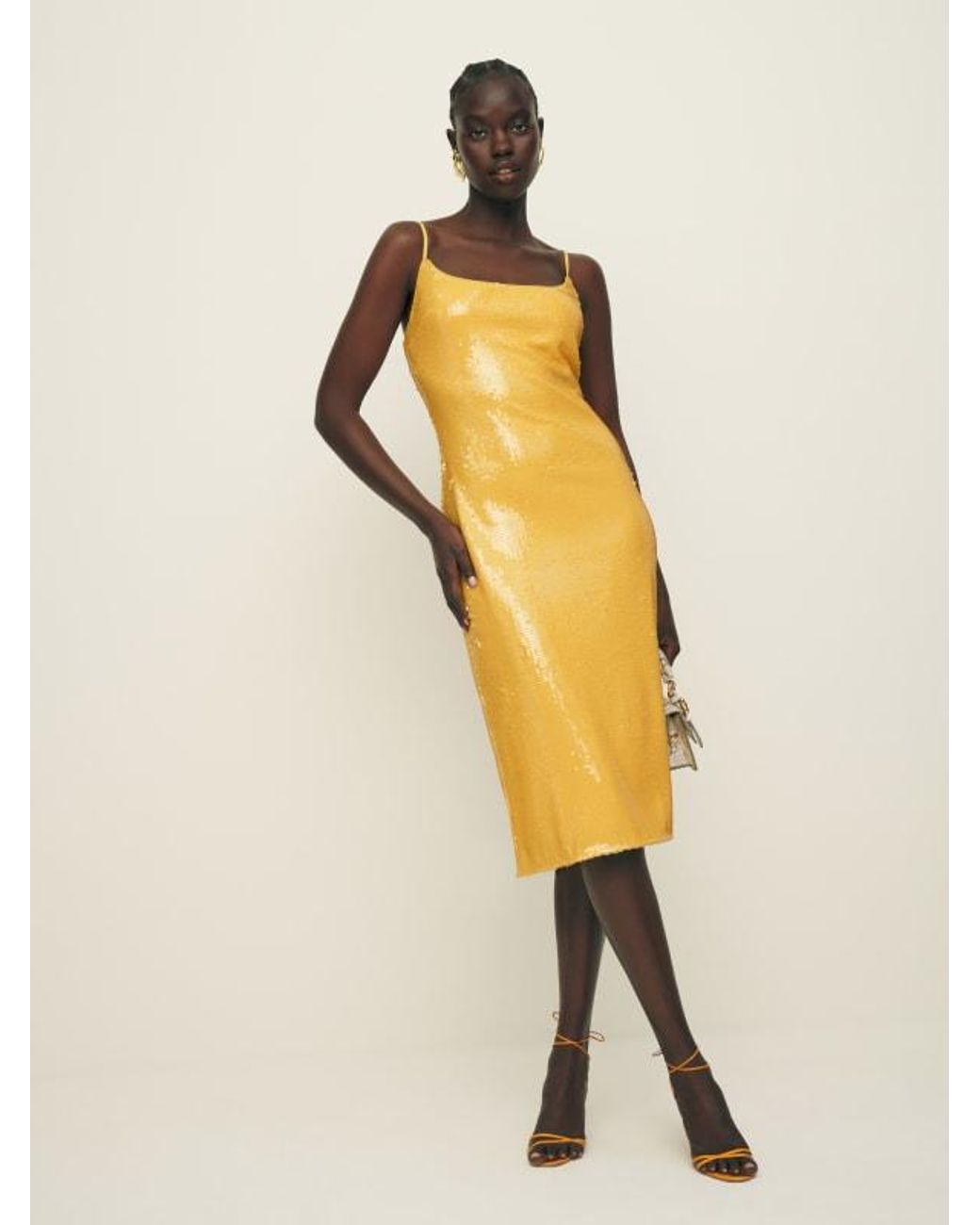 knee length dresses for ladies Rent The Breslin Metallic Green Midi Dress By Reformation main image 1
