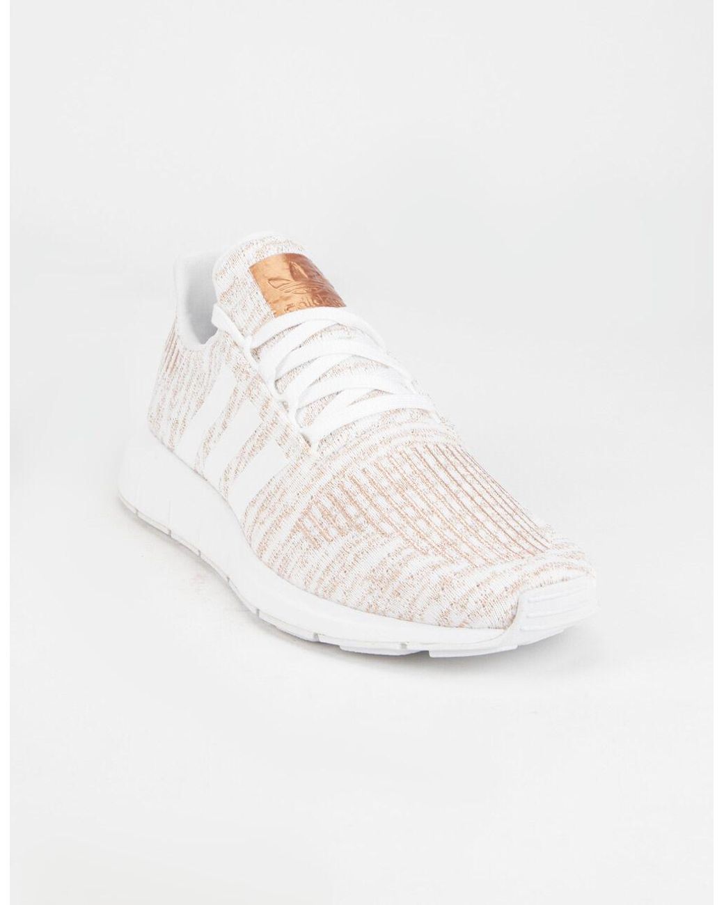 adidas white shoes with rose gold stripes