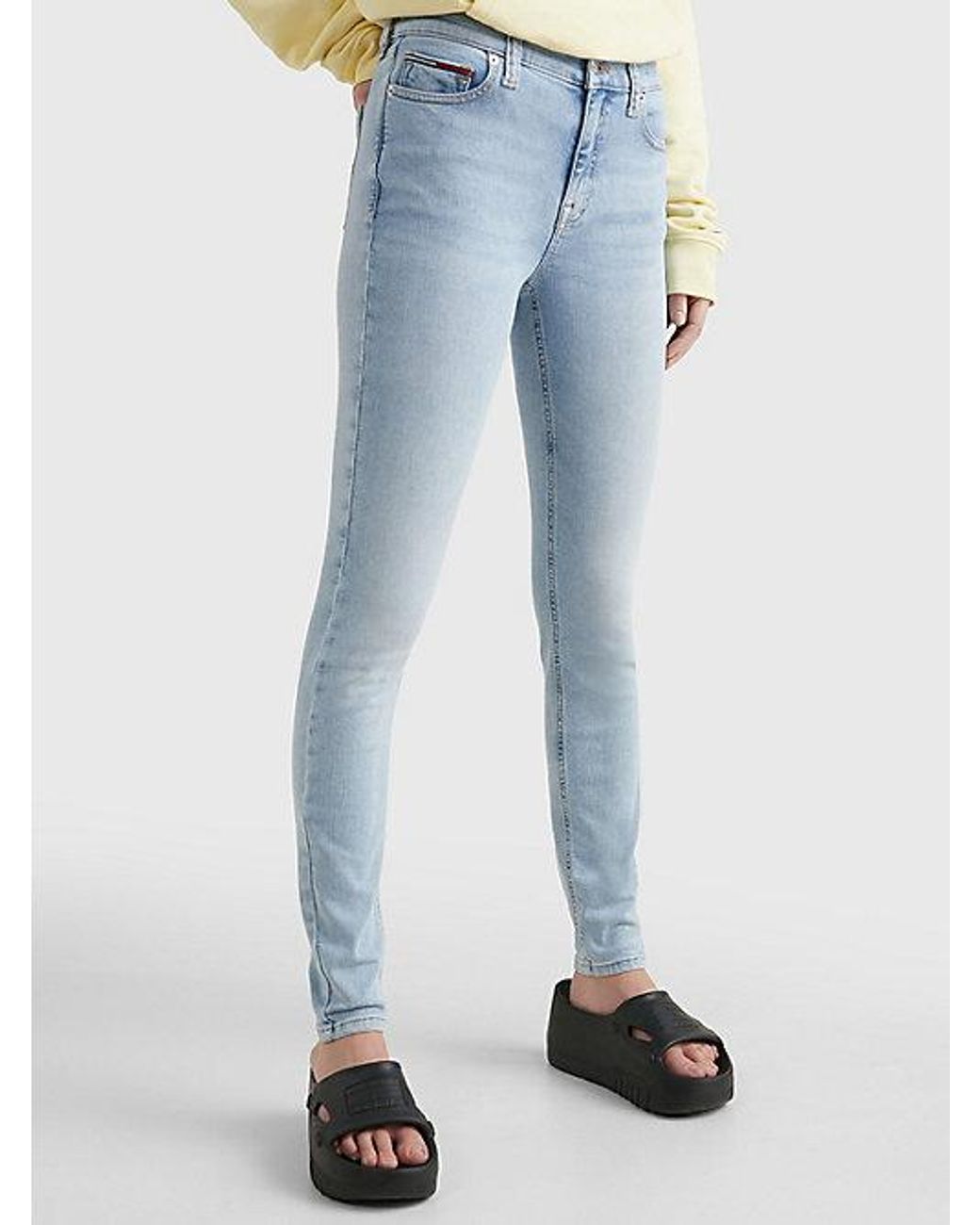 Tommy Hilfiger Nora Medium Rise Skinny Faded Jeans in het Blauw | Lyst NL