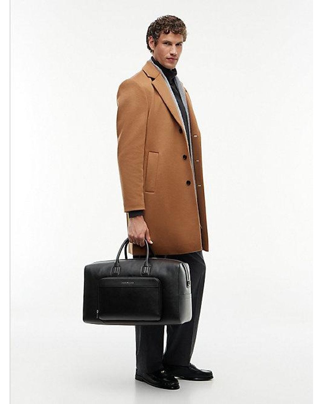 Tommy Hilfiger Black Metal Logo Pebble Grain Duffel Bag for men