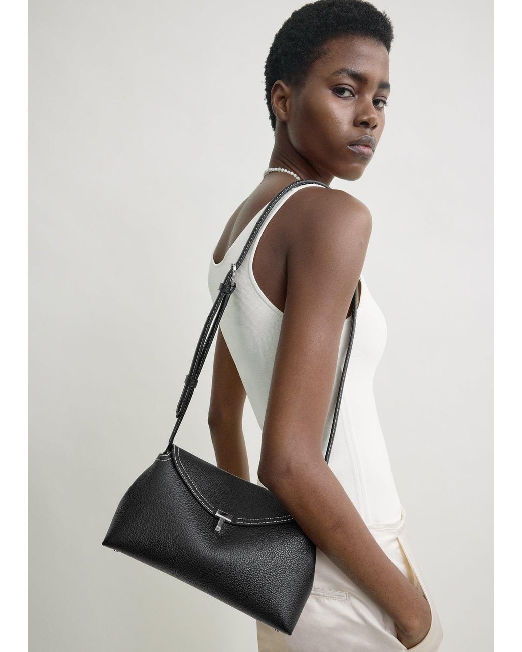 Totême Black T-Lock Grained-Leather Clutch