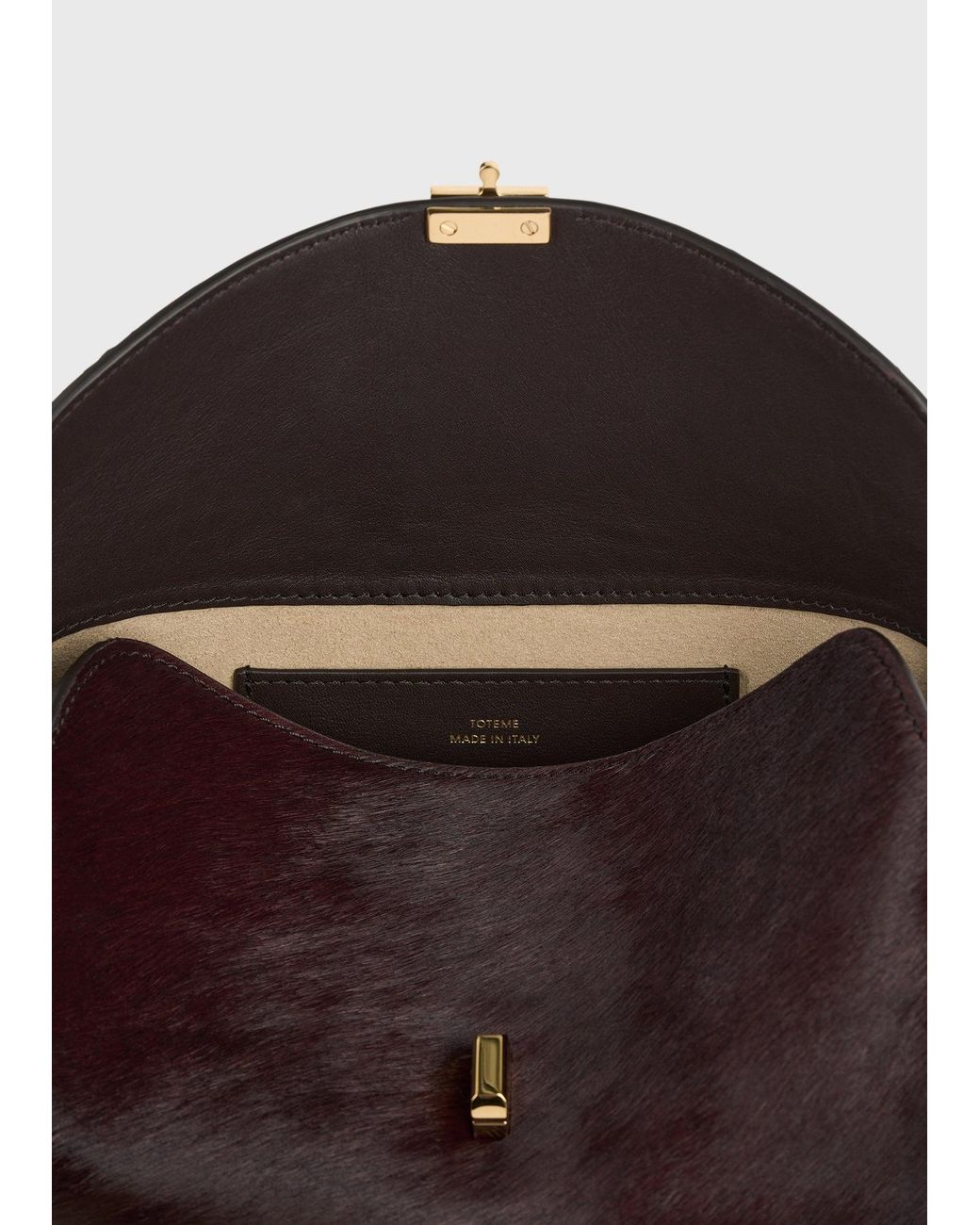 Totême  White T-Lock Pony Hair Clutch