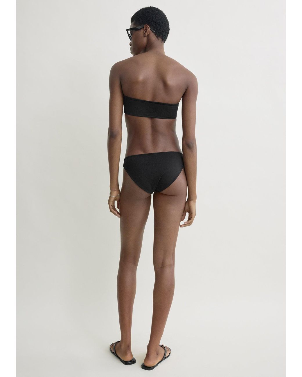 Totême Black Ribbed Strapless Bikini Top