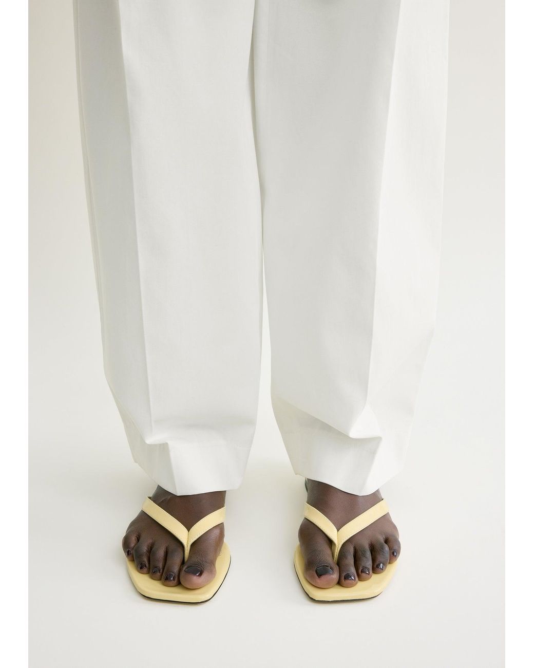 Totême White Naplack Flip Flops