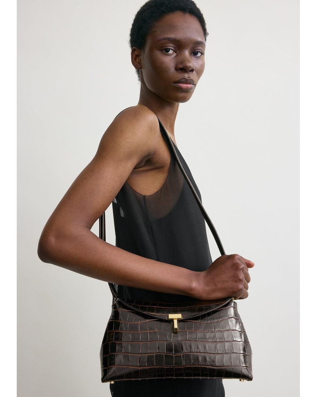 Totême  White T-Lock Croco-Embossed Clutch