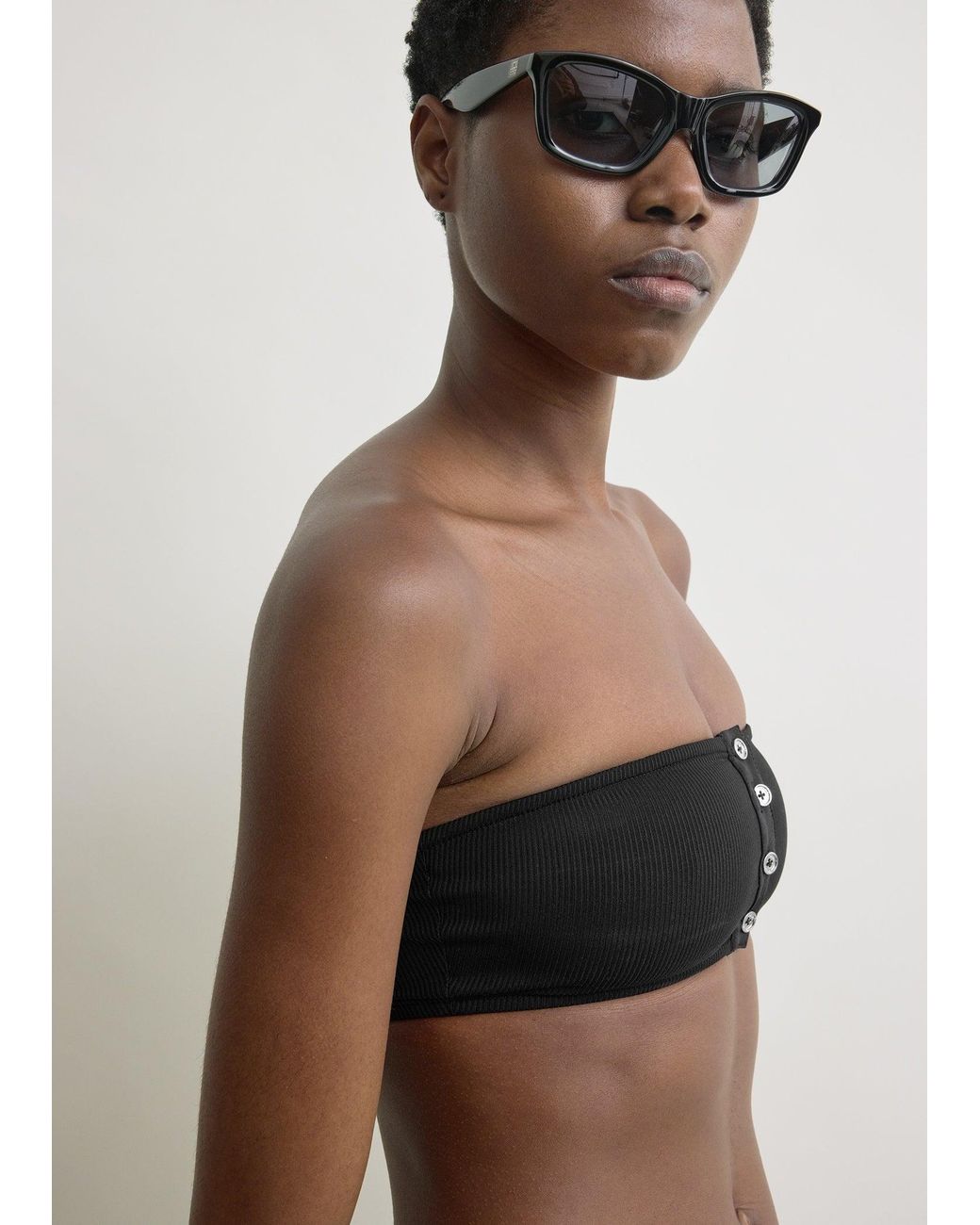 Totême Black Ribbed Strapless Bikini Top