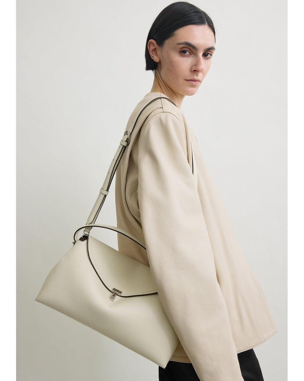 Totême Natural T-Lock Grained-Leather Top Handle Milk