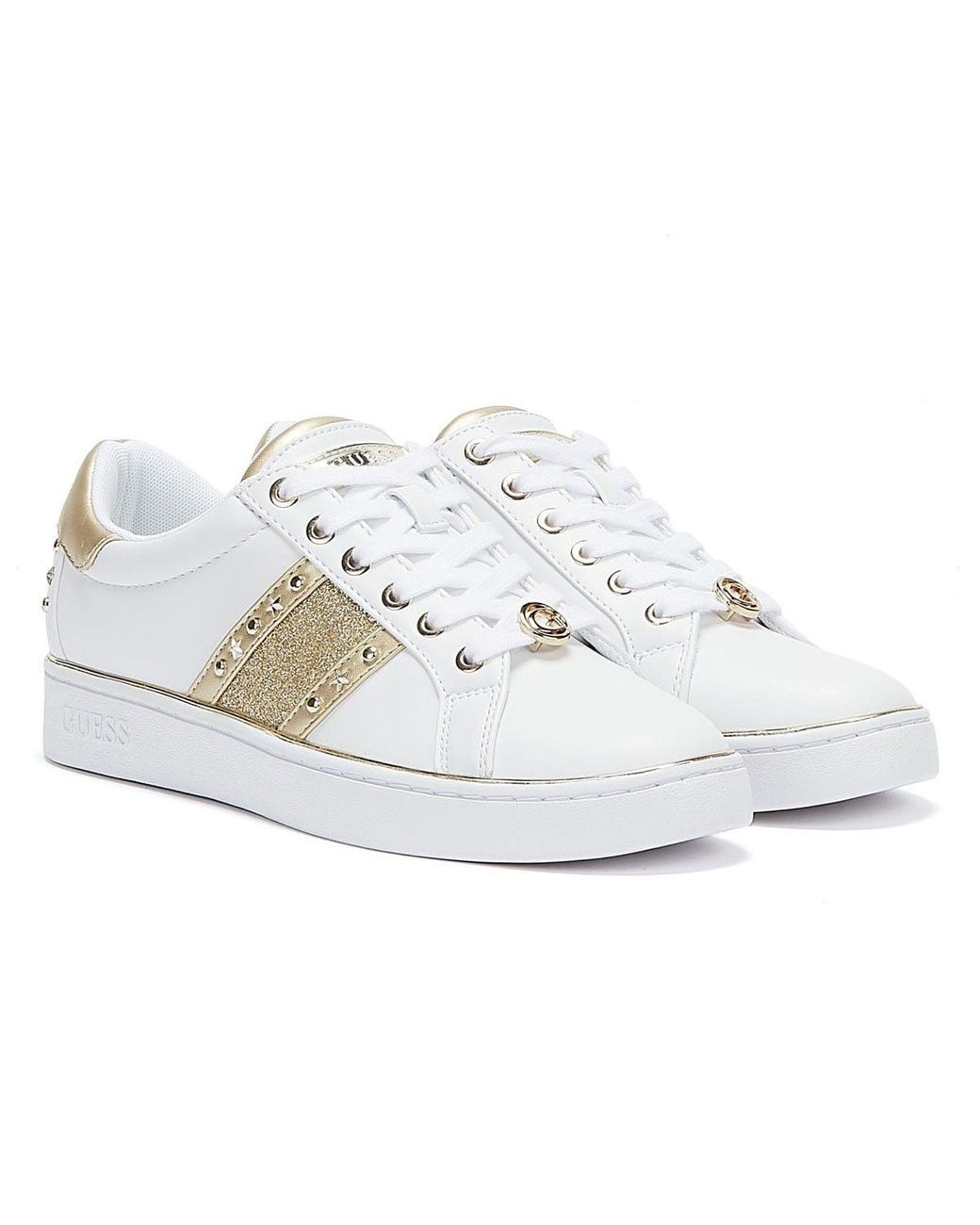 white and gold guess shoes