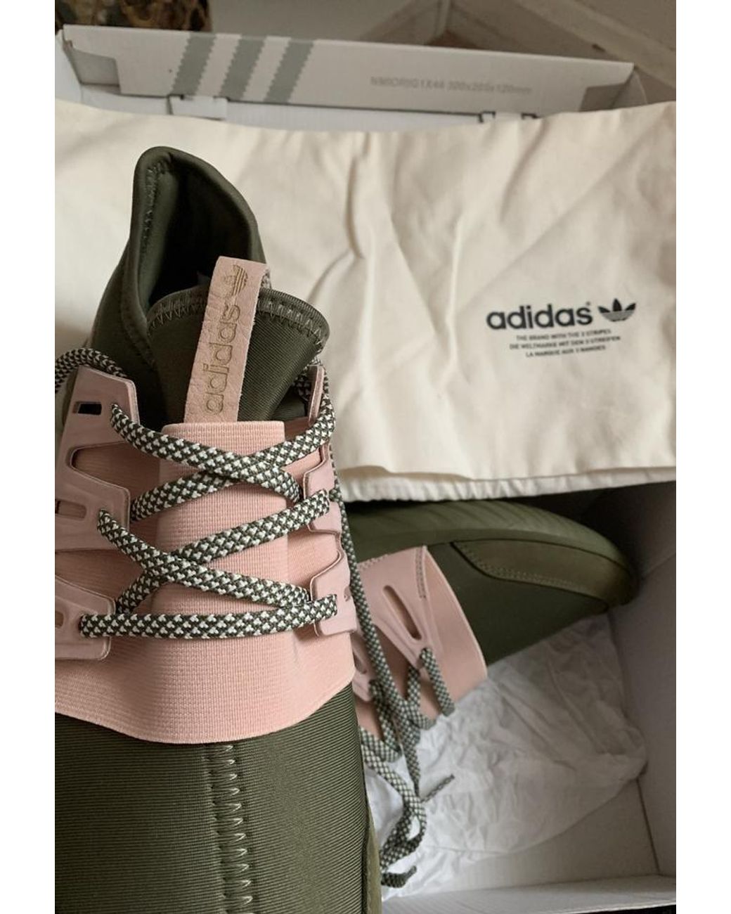 olive green and pink tubular adidas