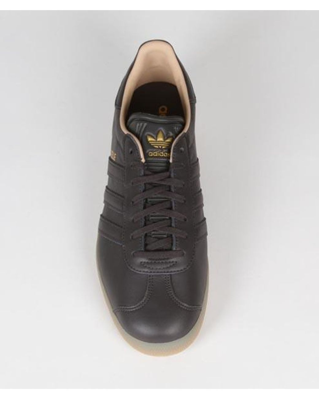 Chaussures Gazelle en cuir doré d'origine avec gomme noire Cuir adidas pour  homme en coloris Noir | Lyst