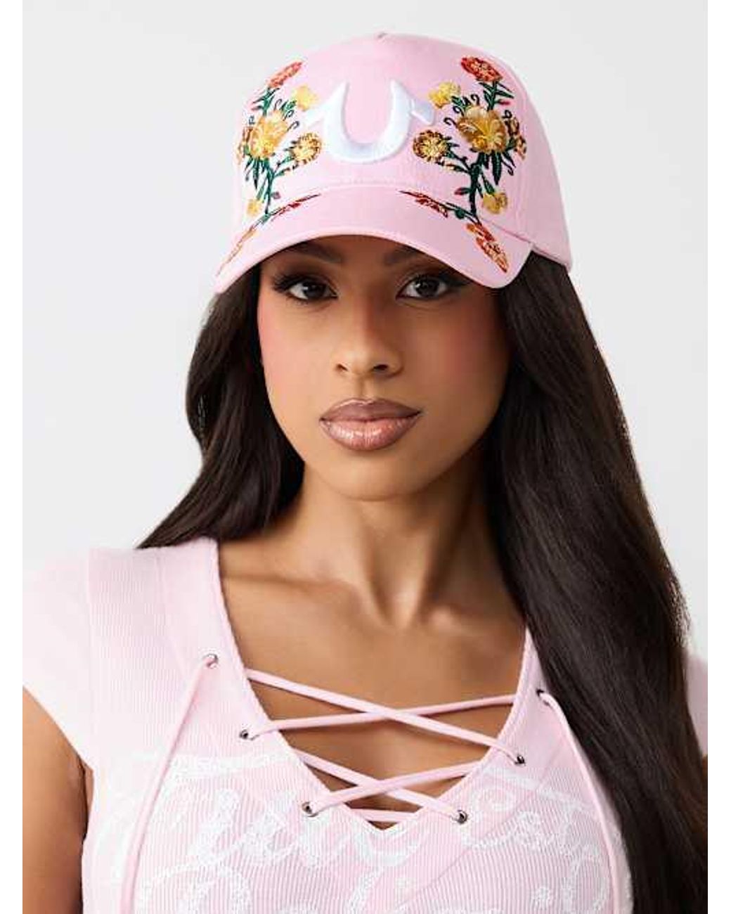 TRUE RELIGION Embroidered Flower Horseshoe Baseball Hat in  display picture 1