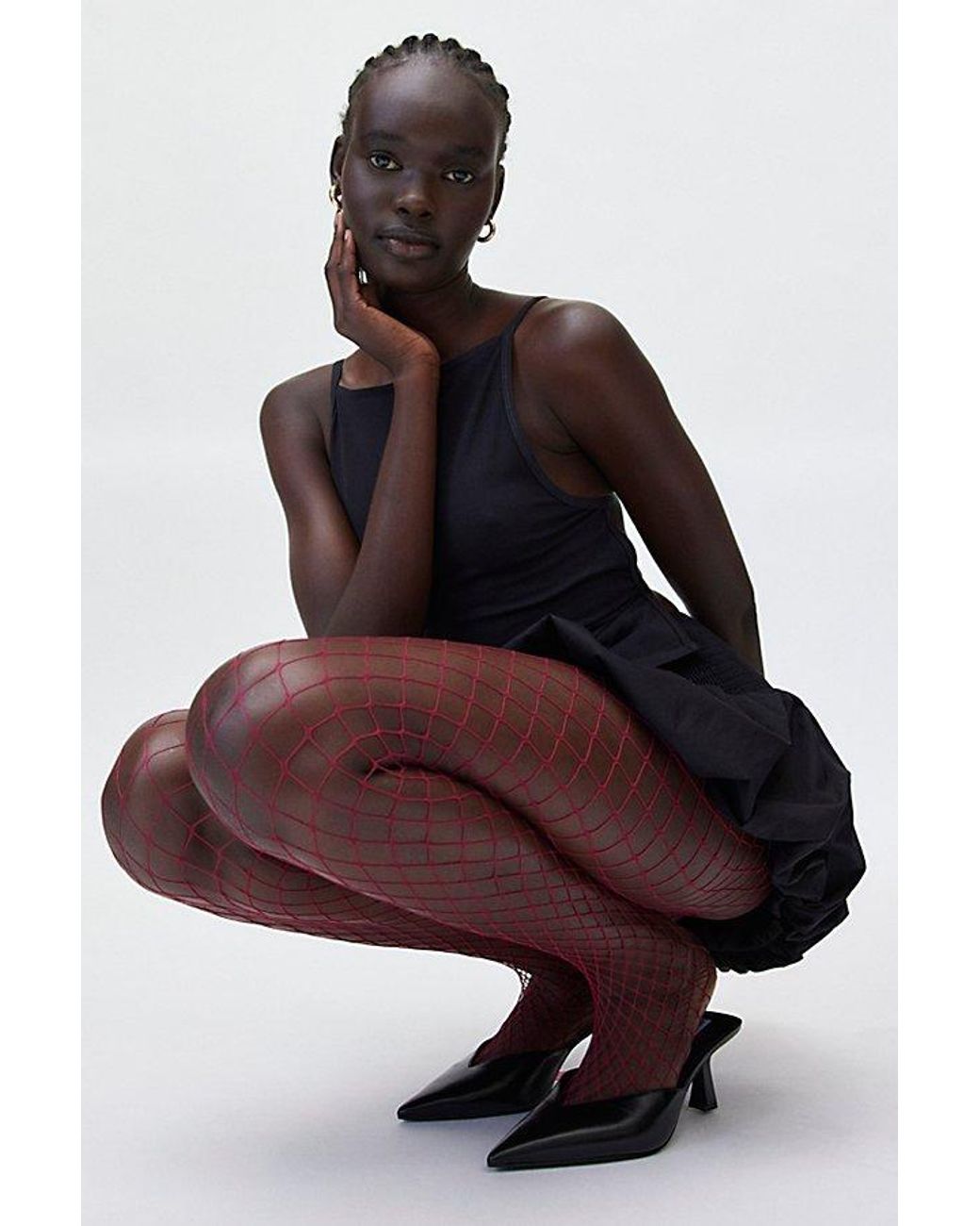 Designer fishnet tights hotsell