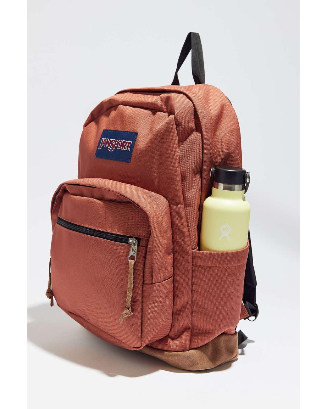 burnt orange jansport right pack Backpack - Durable Daypack with Padded 15" Laptop Sleeve, Spacious Main Compartment & Integrated Water Bottle Pocket Featuring a suede leather bottom for extra durability Jansport Rightpack in Copper Brown