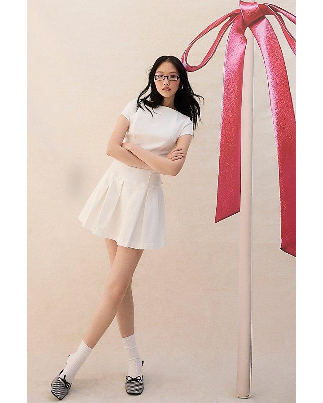 Urban Outfitters Uo Bryan Bow-Back Pleated Drop Waist Denim Mini Dress in  White | Lyst