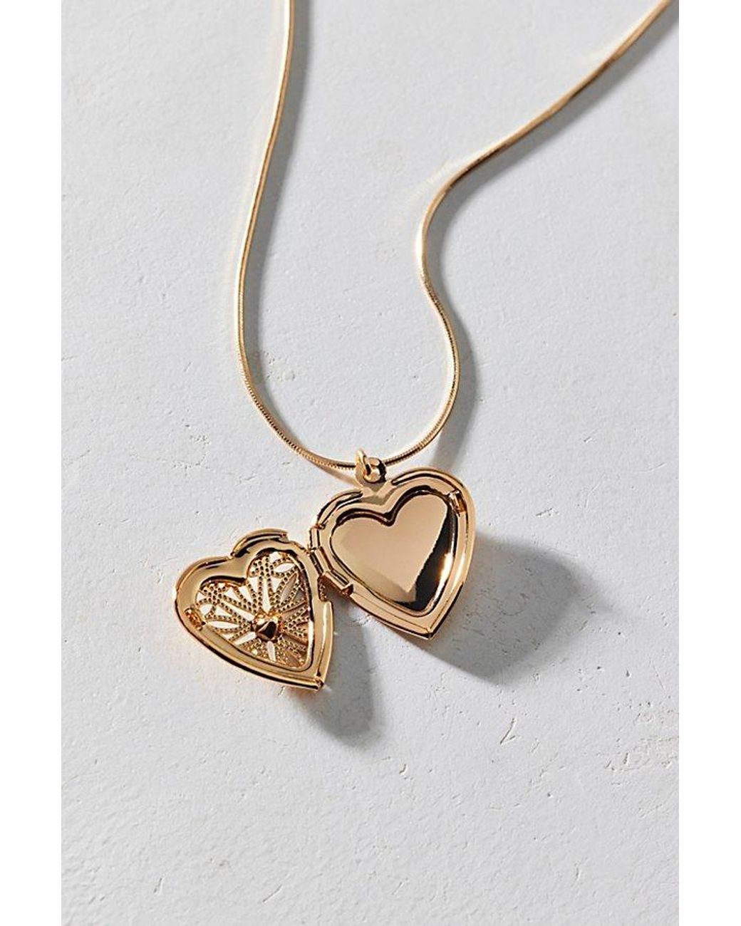Urban Outfitters White Celeste Heart Locket Pendant Necklace