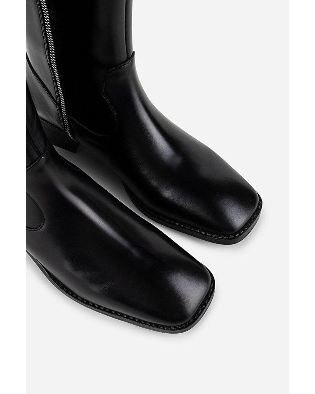 INTENTIONALLY ______ Black Tame Shoe