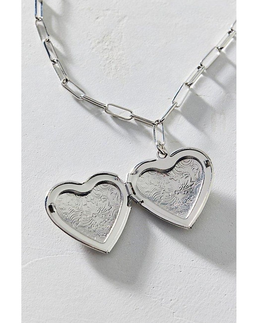 Urban Outfitters White Ursa Heart Locket Pendant Necklace