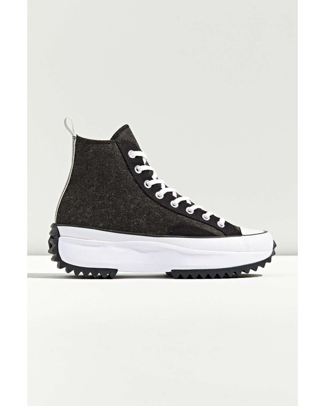 black run star hike high top sneakers