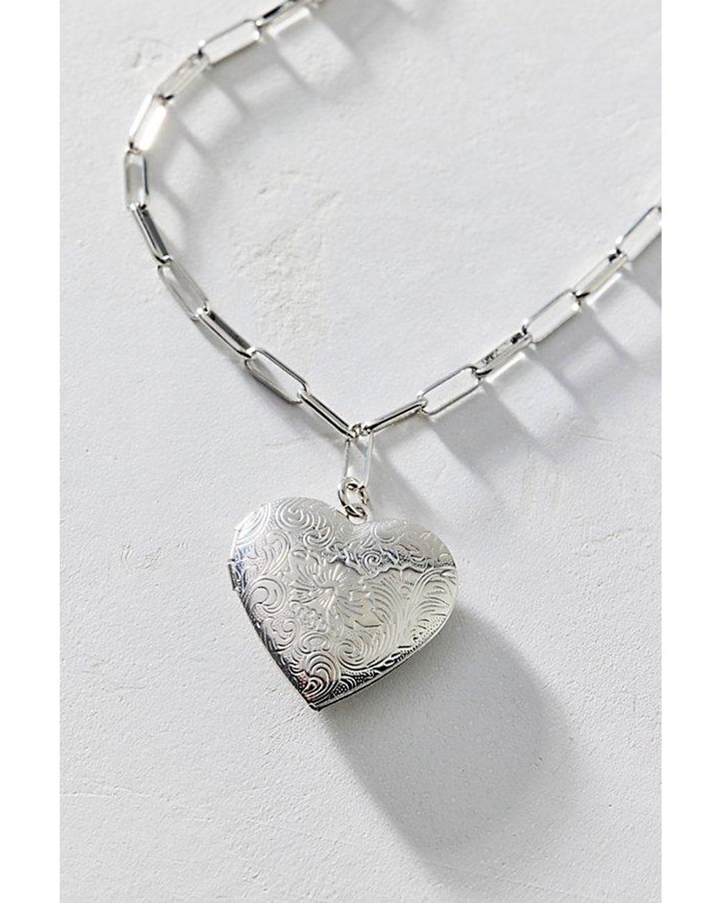 Urban Outfitters White Ursa Heart Locket Pendant Necklace