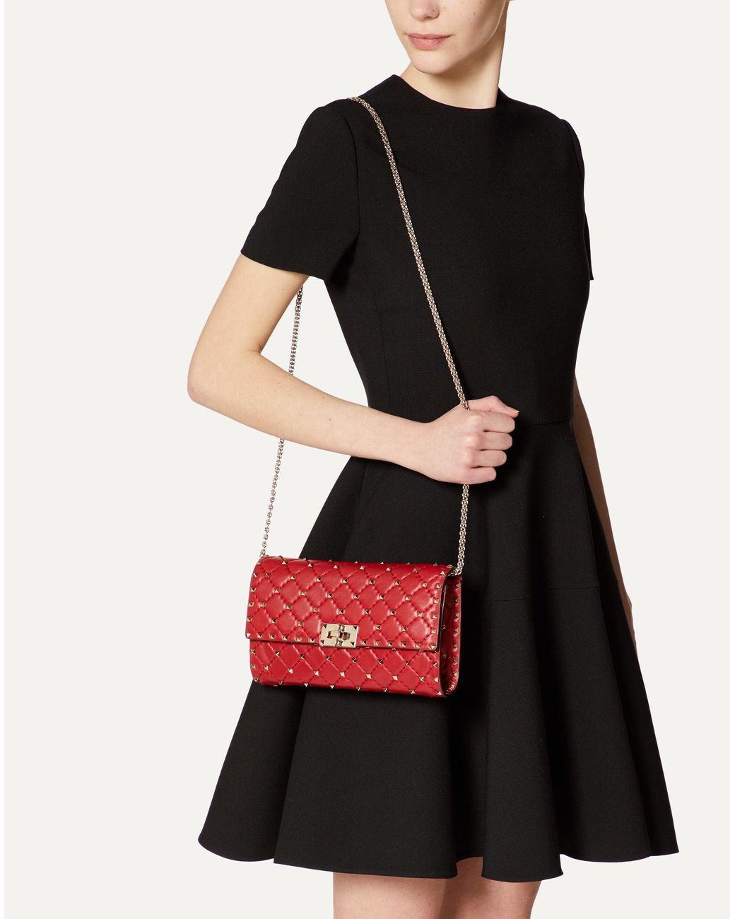 rockstud spike crossbody clutch