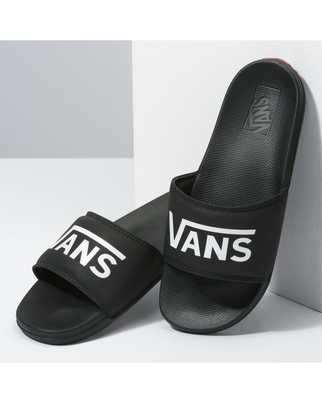 vans black slide on