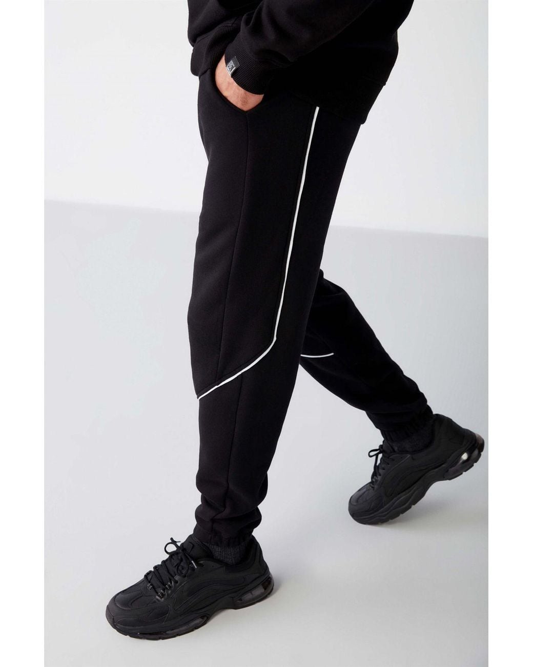 Grimelange Black Relaxed Tapered Joggers for men