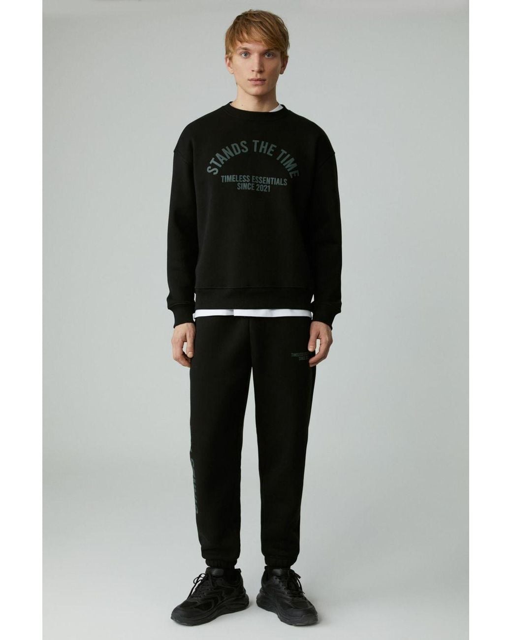 Grimelange Elastische Joggingbroek Met Tekstprint in het Black voor heren